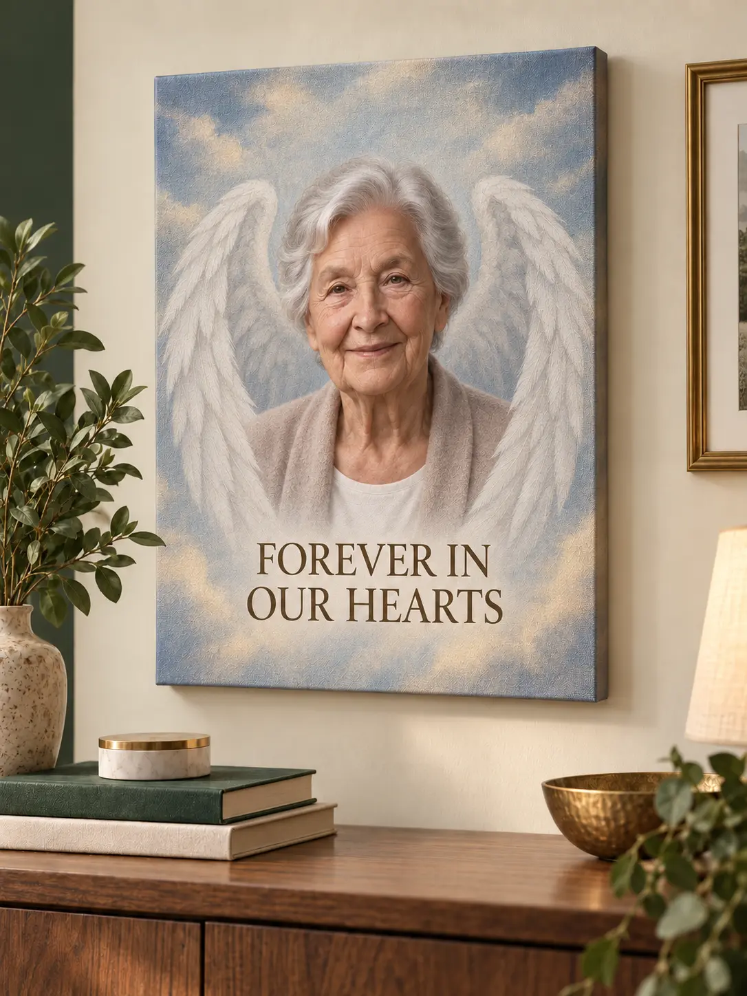 Personalized angel wings memorial canvas displayed in a home